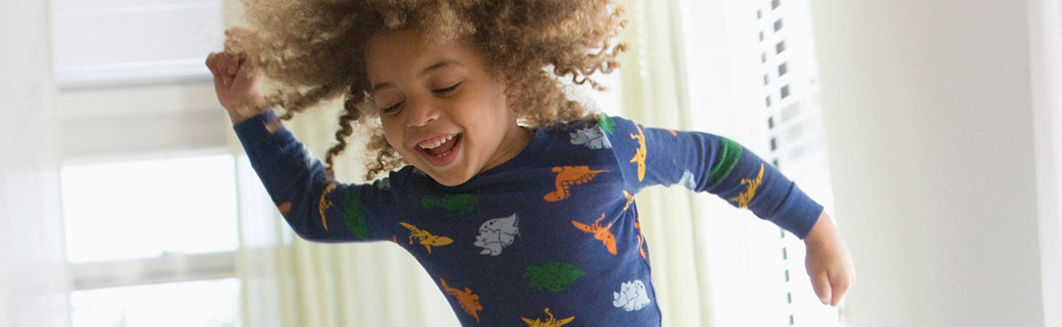 A happy young girl Playing